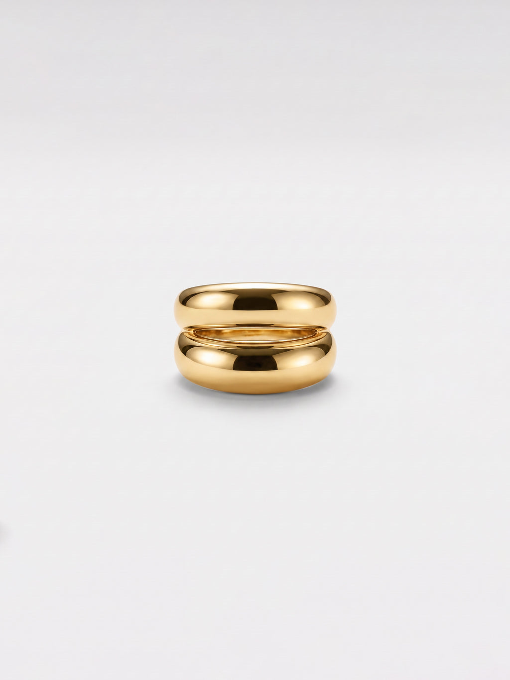 Double dome ring on a clean white background.