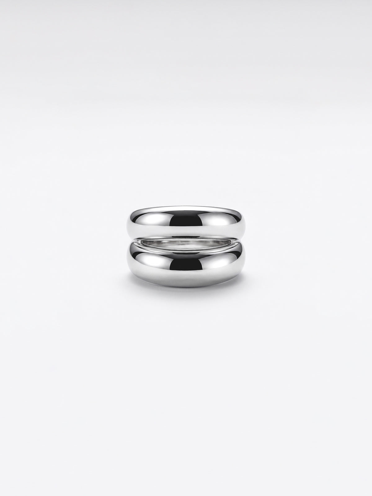 Double dome ring on a clean white studio background.