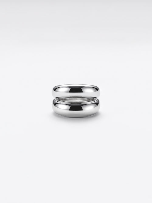 Double dome ring on a clean white studio background.