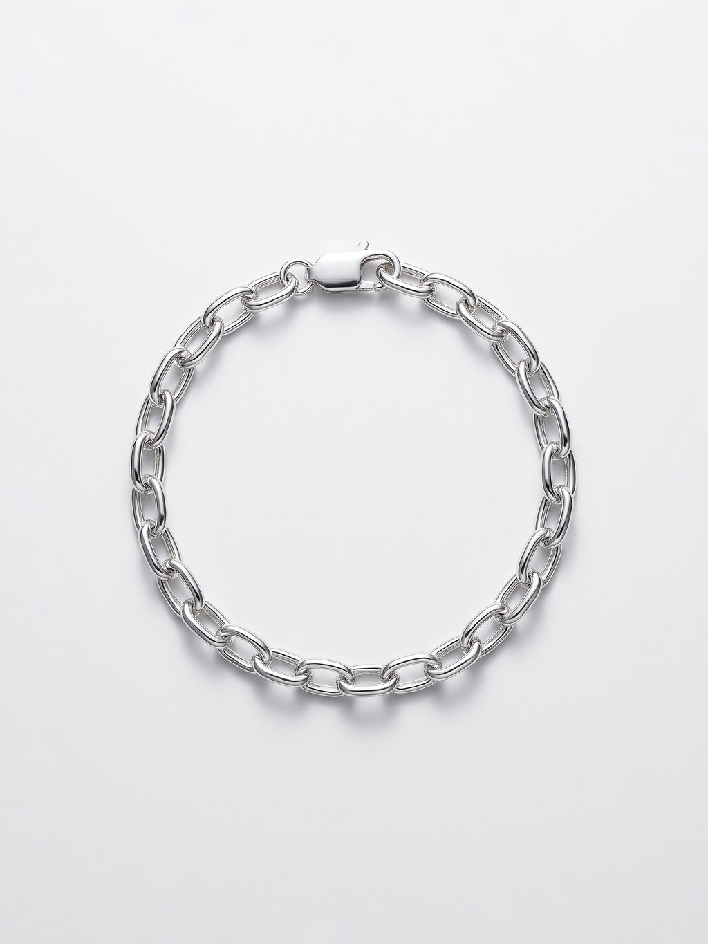 A silver chain link bracelet with a polished finish and a lobster clasp, displayed on a clean white background.